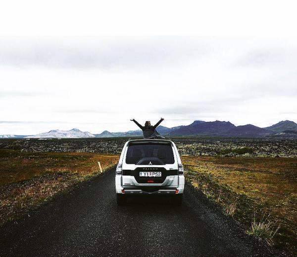 Kate Hay and car on the road